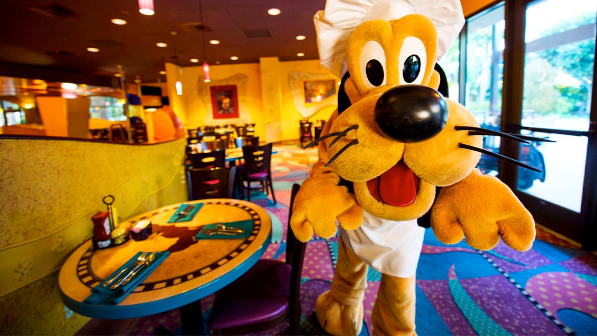 A mascot of a Disneyland character called Goofy inside the restaurant